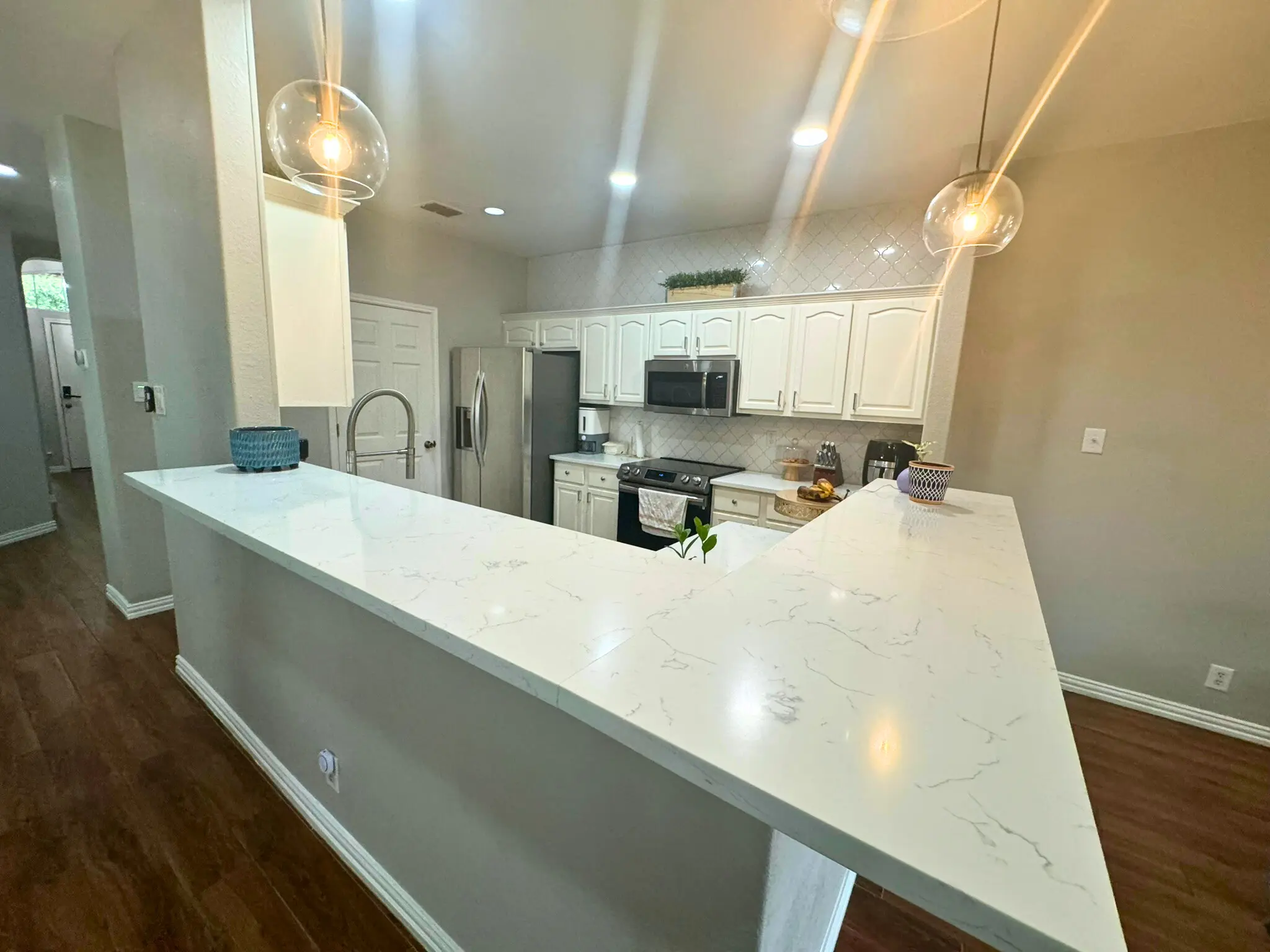 Modern kitchen with marble counters